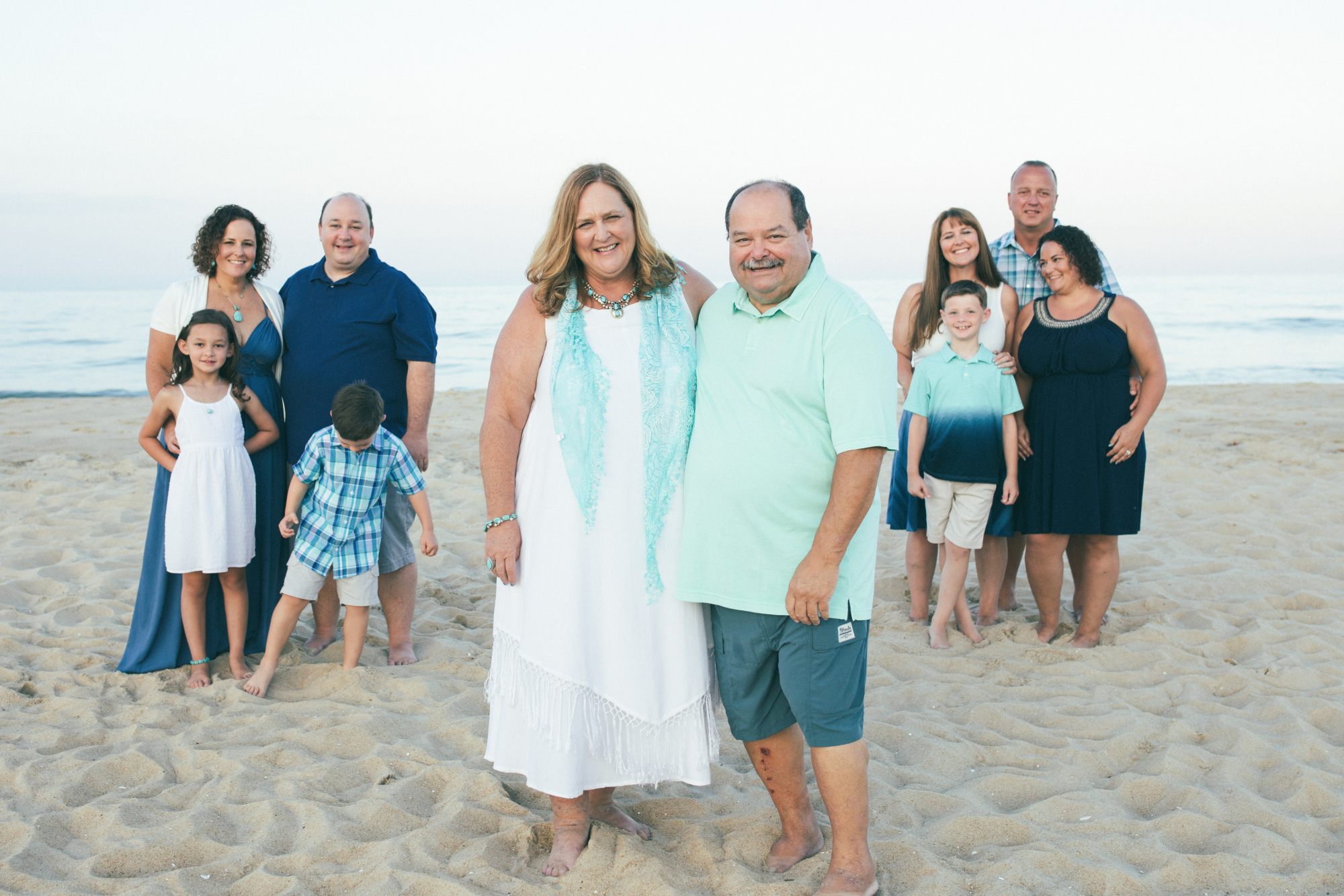 Candid family photo on Fenwick Island shoreline