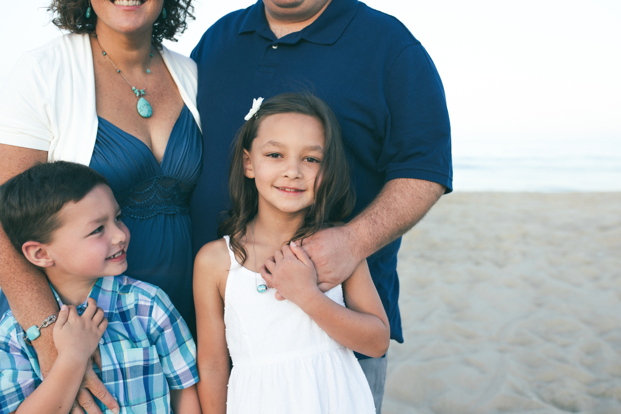 Family ocean walk on Fenwick Island